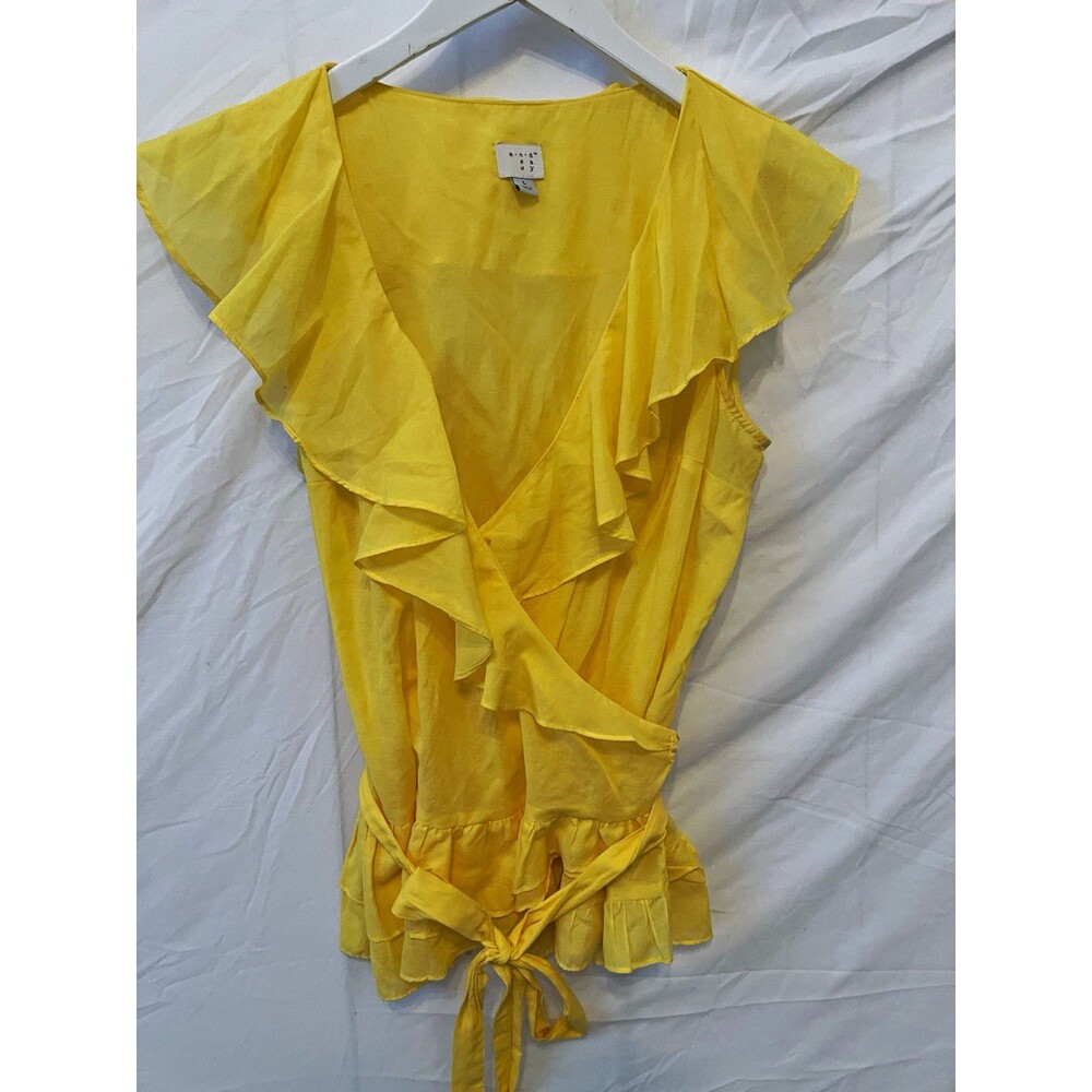 a.n.d. new day Womenโs Yellow Solid V-Neck Wrap Sleeveless Ruffle Blouse L